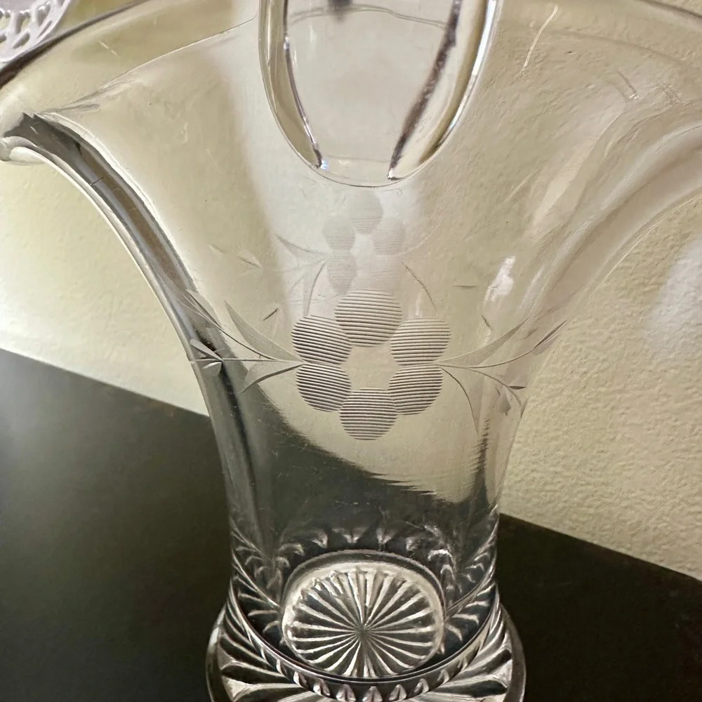 HEISEY GLASS BASKET VASE. CLEAR GLASS WITH ETCHED FLOWER & STEMS.